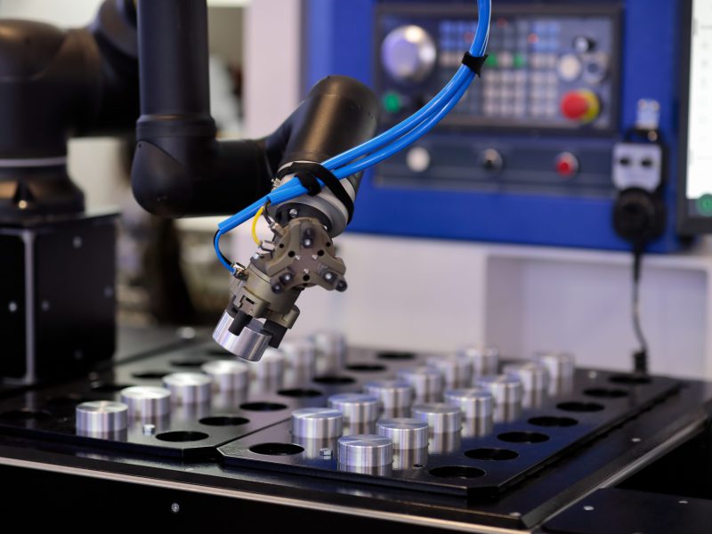 Robot,Manipulator,Loads,Workpiece,In,Cnc,Machine.,Selective,Focus.